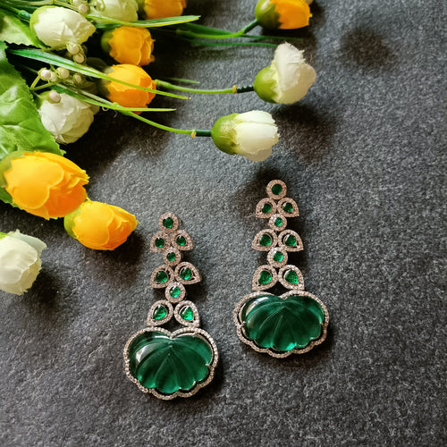 PP6599 EARRING CZ LONG BIG GREEN CARVED STONE