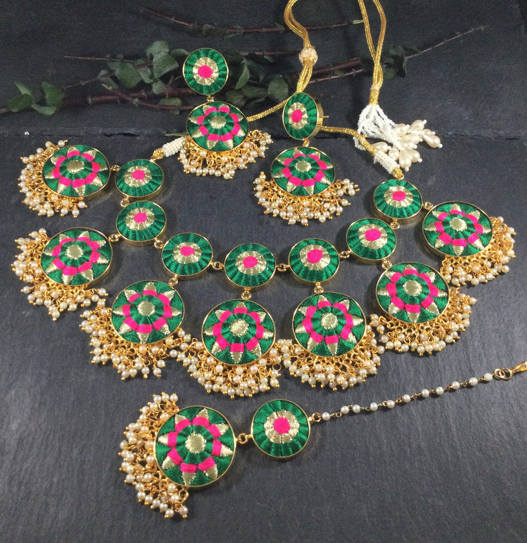 CS45 SARI COLLECTION -  GOLD FINISH DOUBLE LAYER NECKLACE SET STUDDED WITH PEARLS AND ZARI SILK THREAD EMBROIDERY - EMERALD GREEN